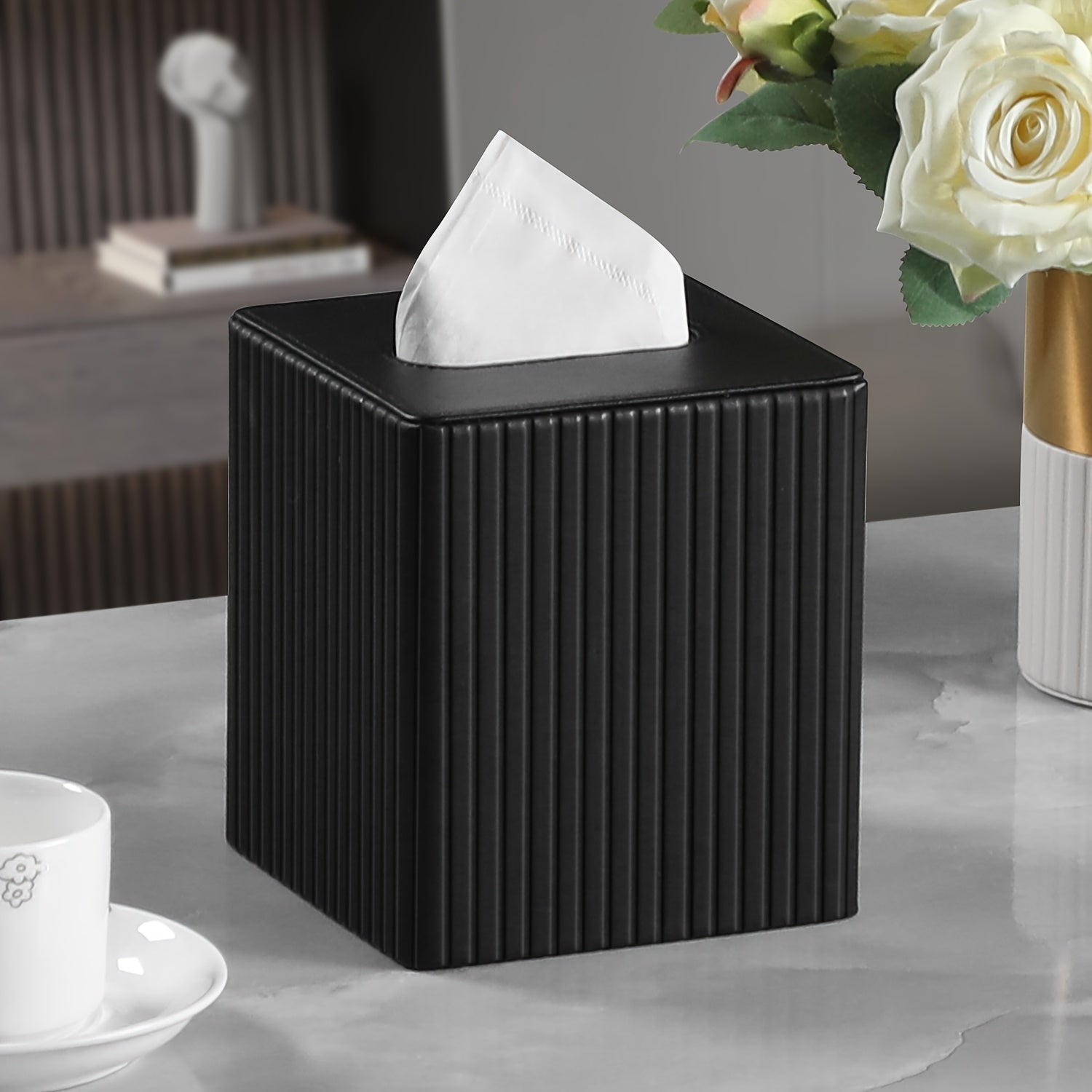 A Square Tissue Box in Elegant Colors, Made of PU Leather, Featuring a Magnetic Closure at The Bottom, with a Striped Decorative Surface, Suitable for Bathrooms, Bedrooms, Or Offices.